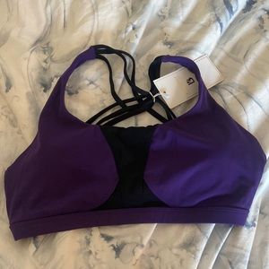 Buff bunny purple and black sports bra. Size medium. New with tags.